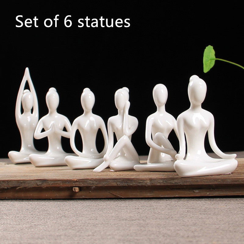 Ceramic figures in lotus pose