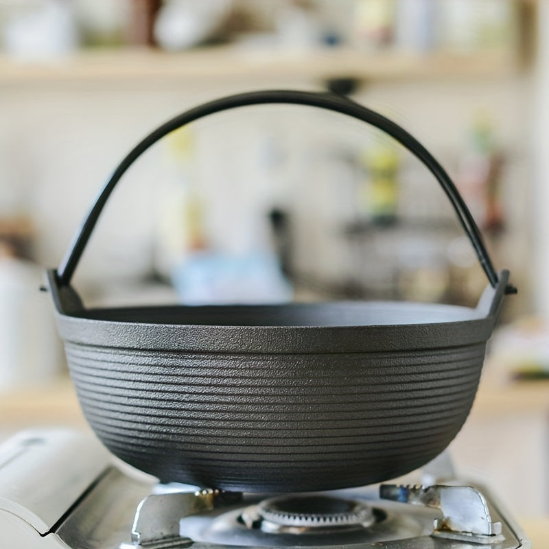 Cast iron camping pot with wooden lid