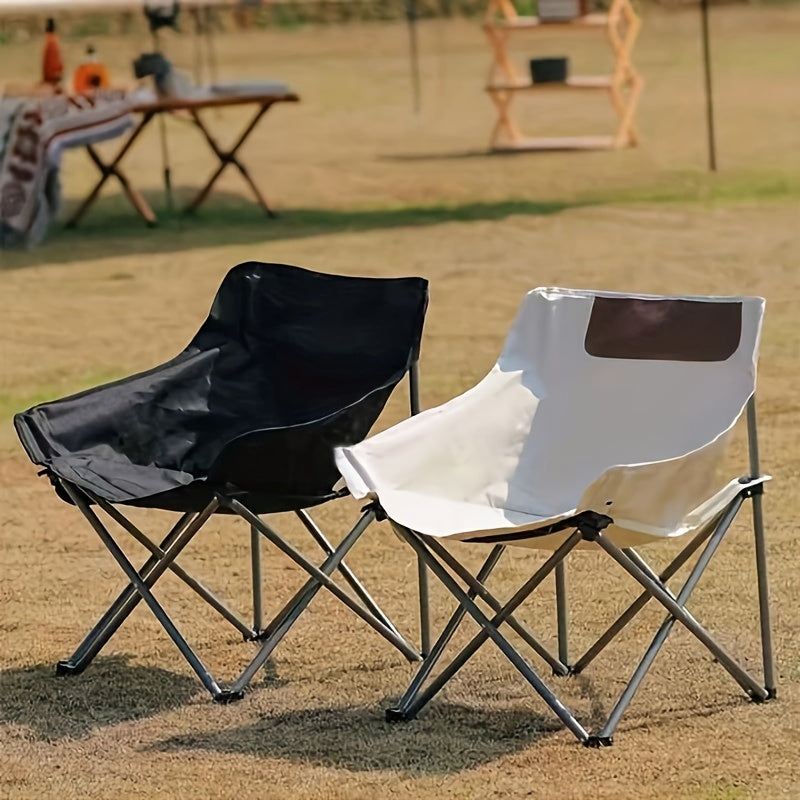 Folding camping chair with storage pocket