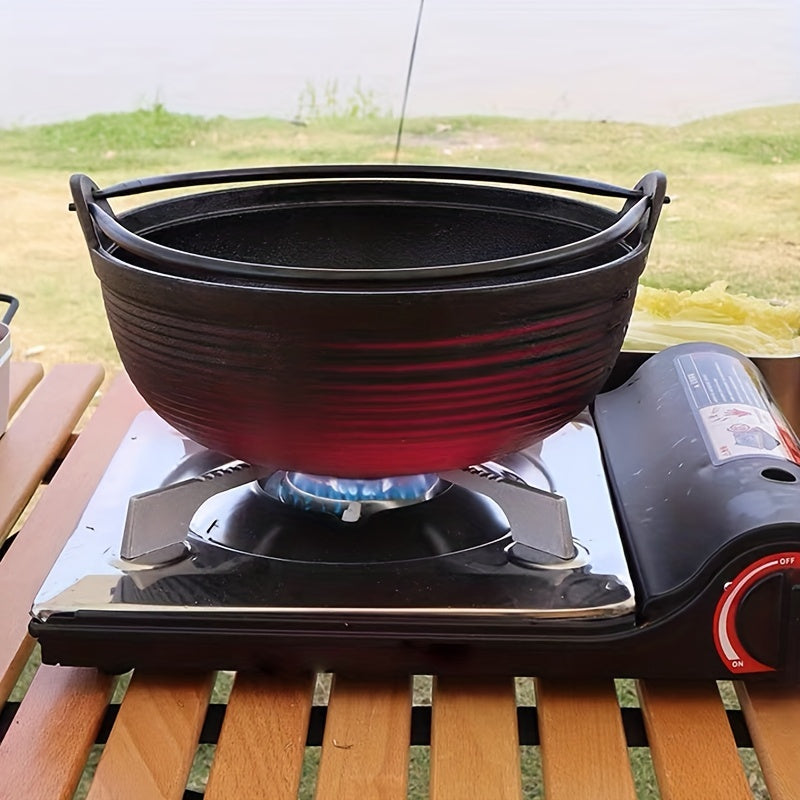 Cast iron camping pot with wooden lid