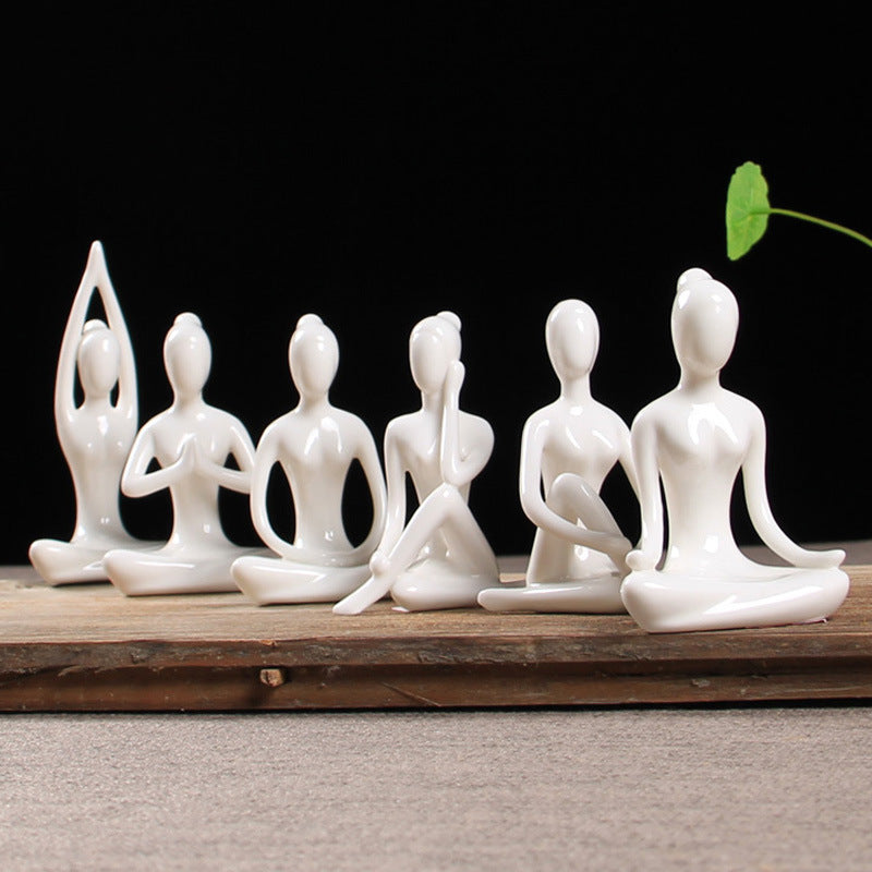 Ceramic figures in lotus pose