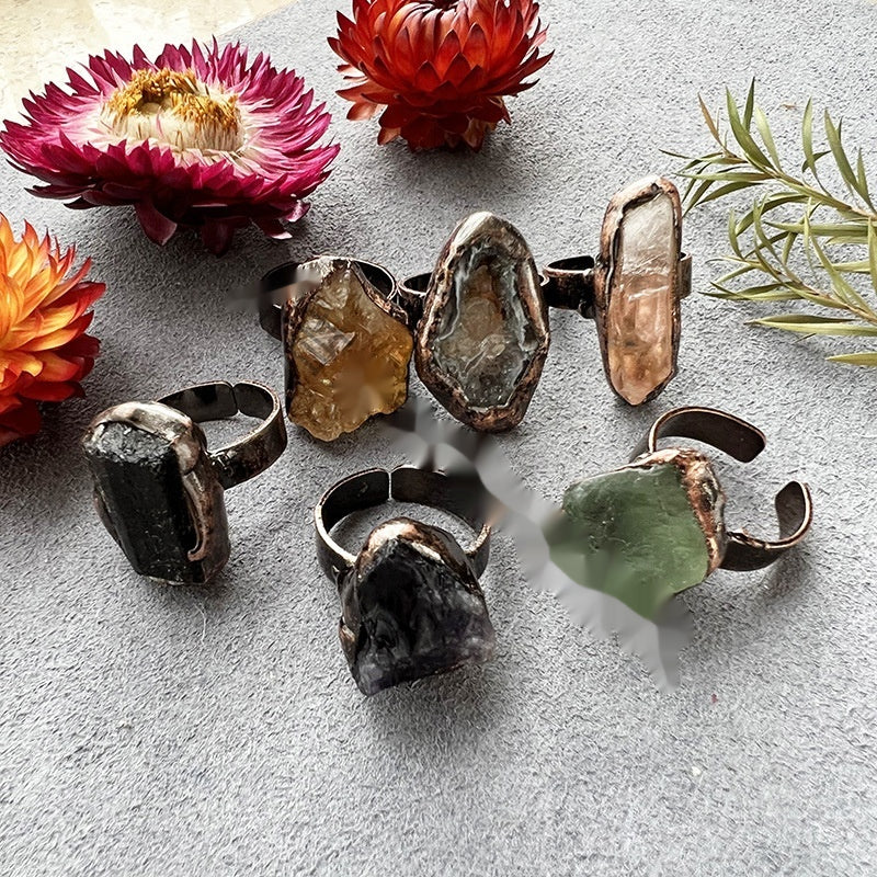 Set of rings with raw natural crystals