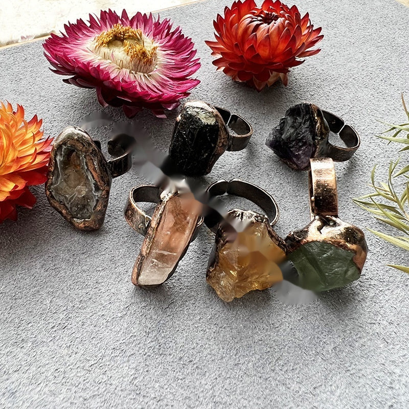 Set of rings with raw natural crystals