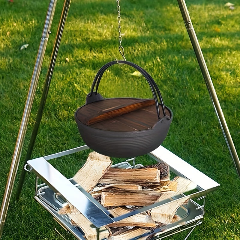 Cast iron camping pot with wooden lid